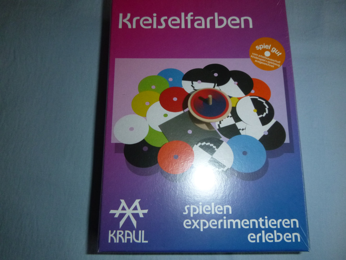 Kreisel in allen möglichen Farben- Experimentierkasten