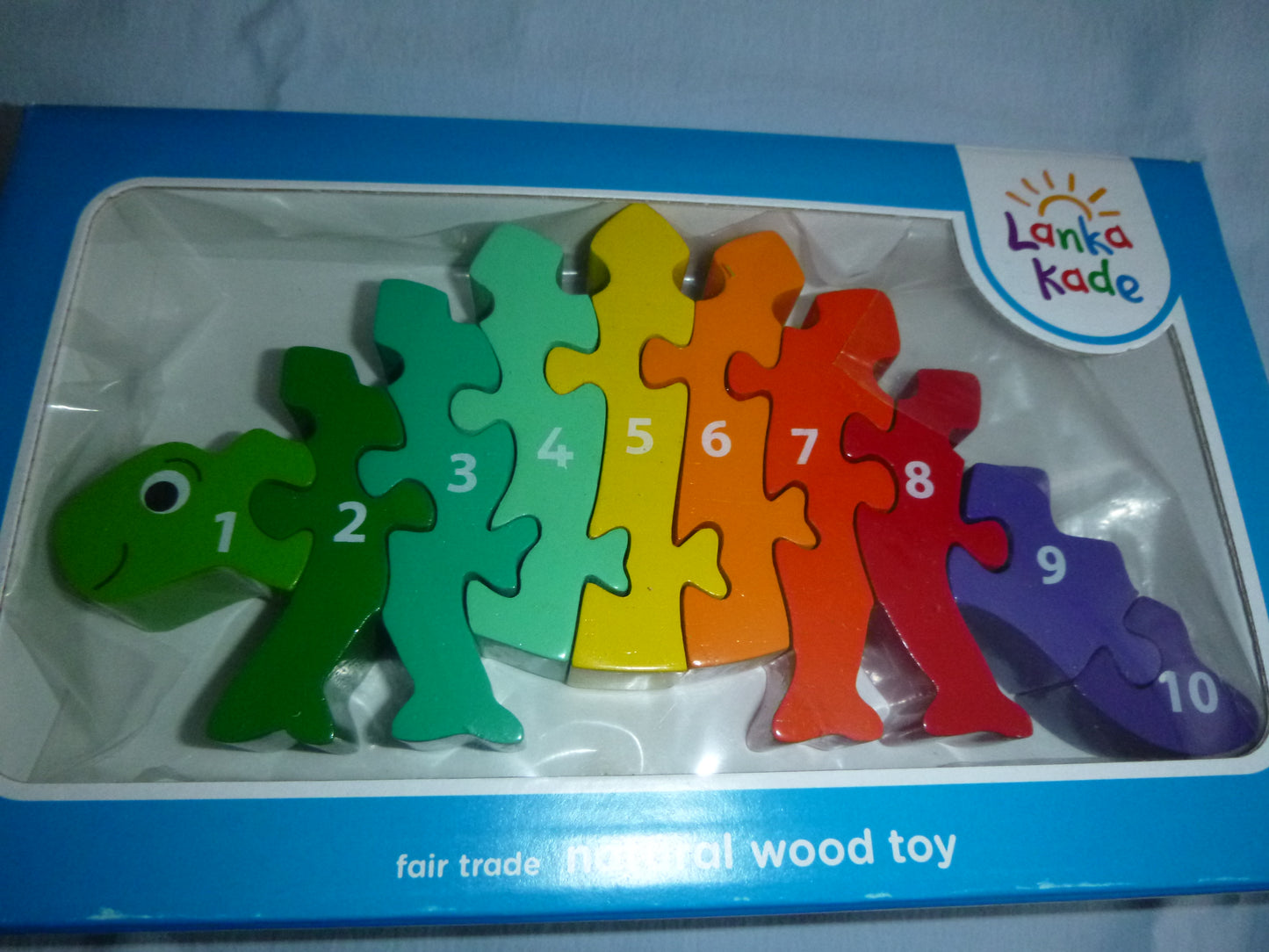 Katze oder bunter Dino als Holz-Puzzle im Regenbogen-Look