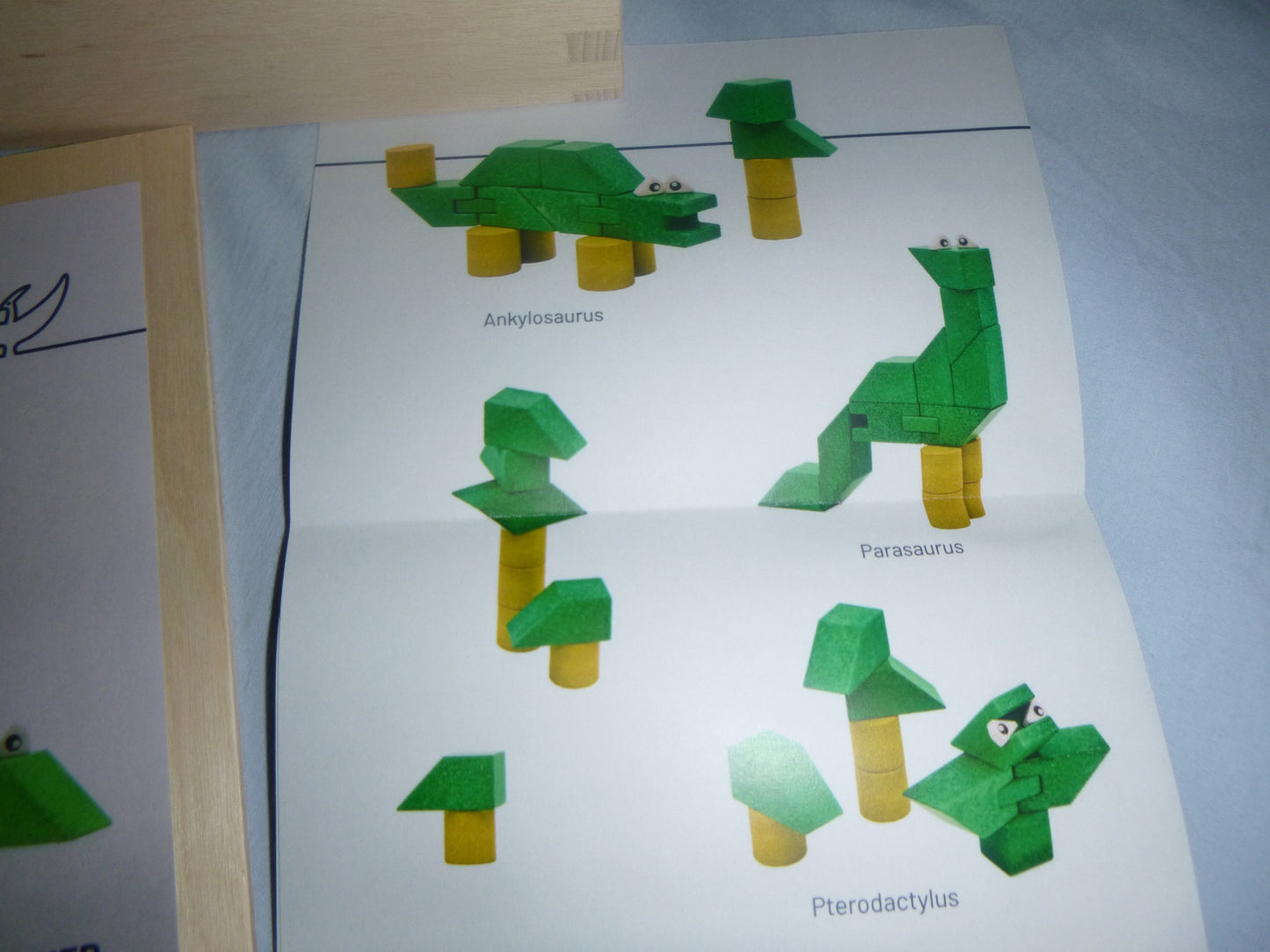 Anker Baukasten Dinolino-der kleine Dino im Holzkasten