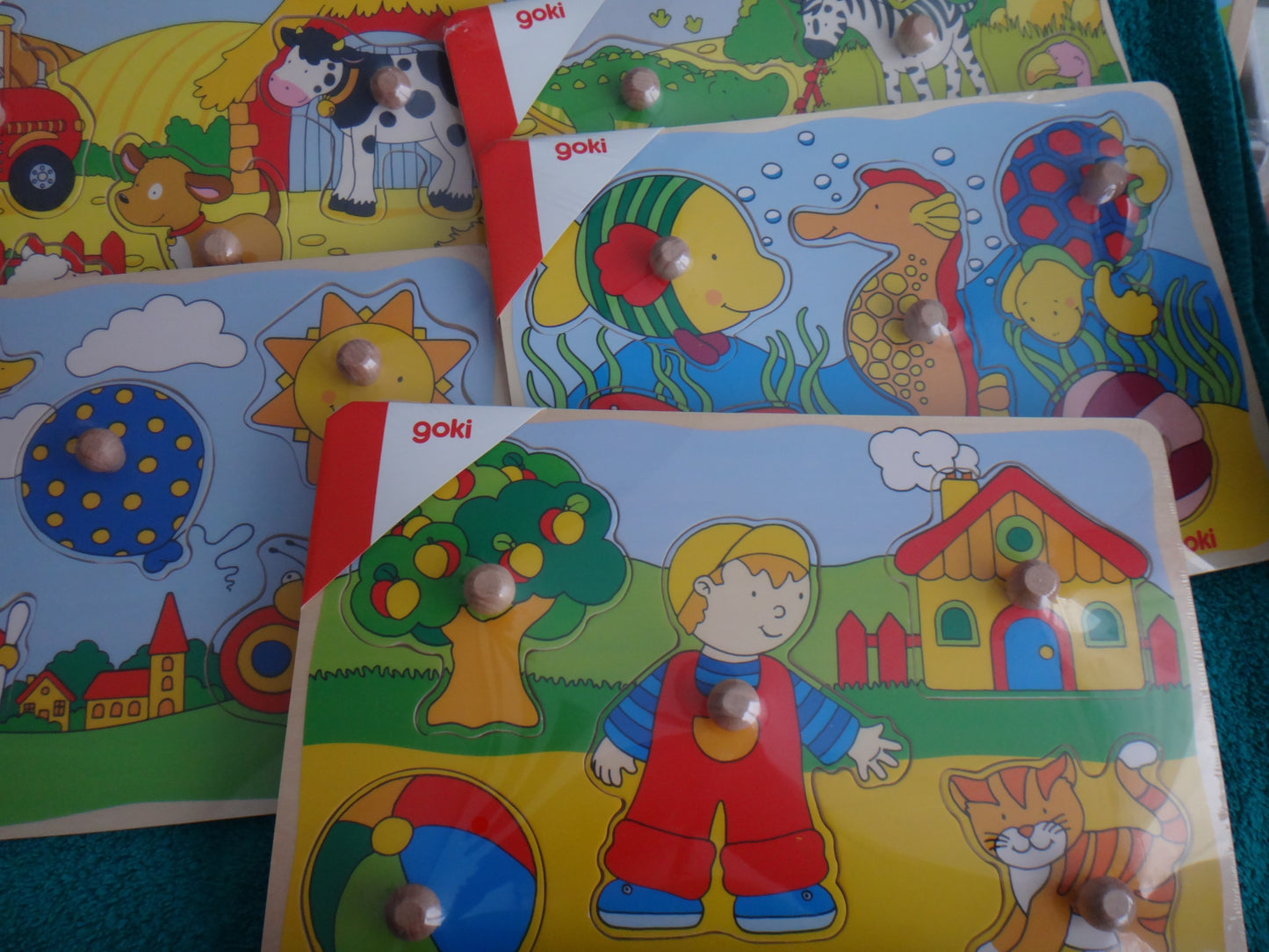 Erste Kinderpuzzle mit 5-8 Teilen und Greifknöpfen